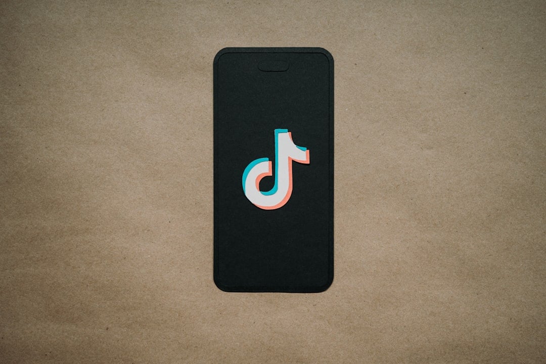 a cell phone with the letter d on it